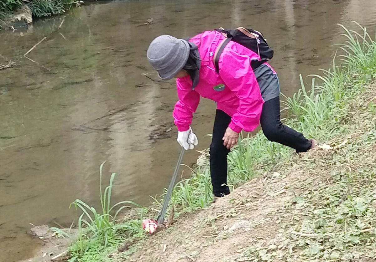 River guards cleaning the river water and riverbank